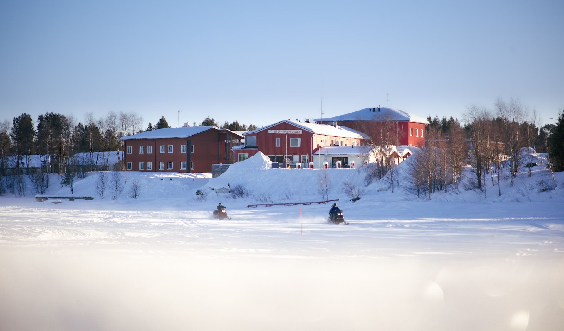 Hotel Inari Winter, Inari Lapland Finland. Two snowmobilers in the front. Pic by Miika Leivo.