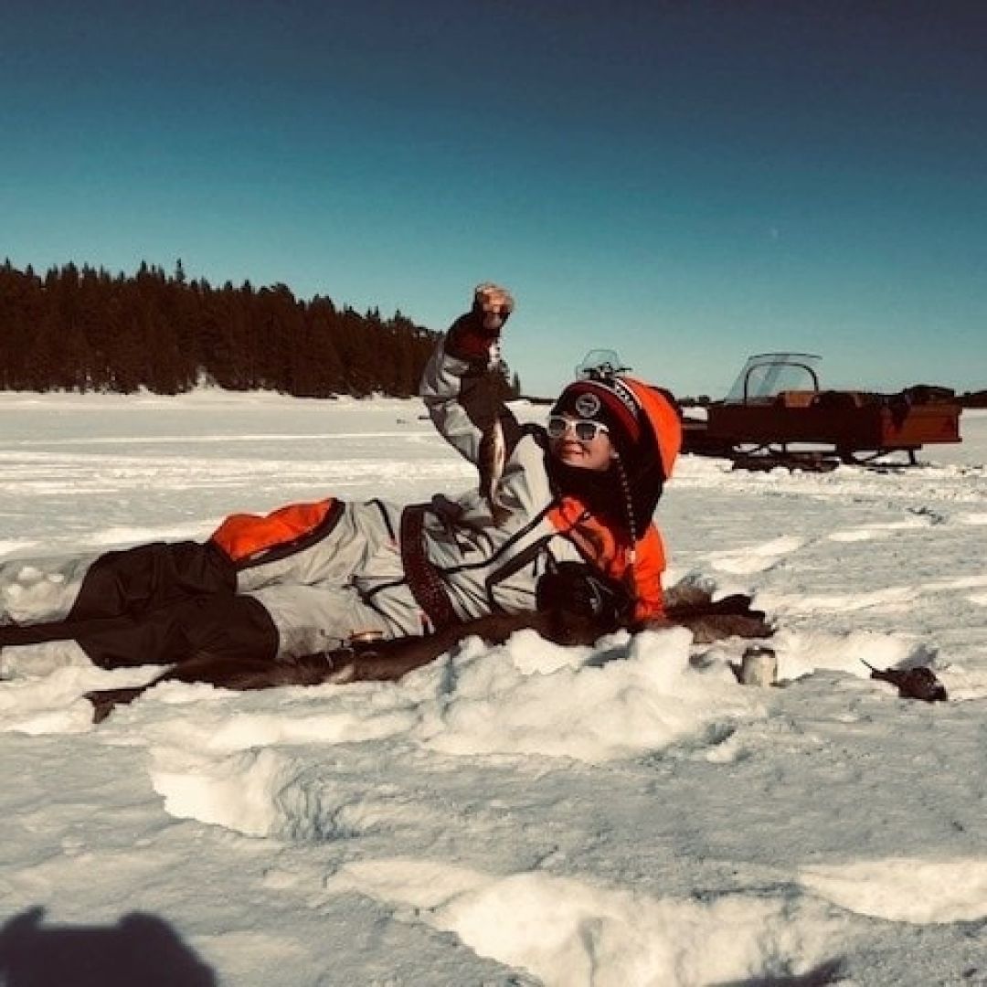 Ice fishing in lake Inari