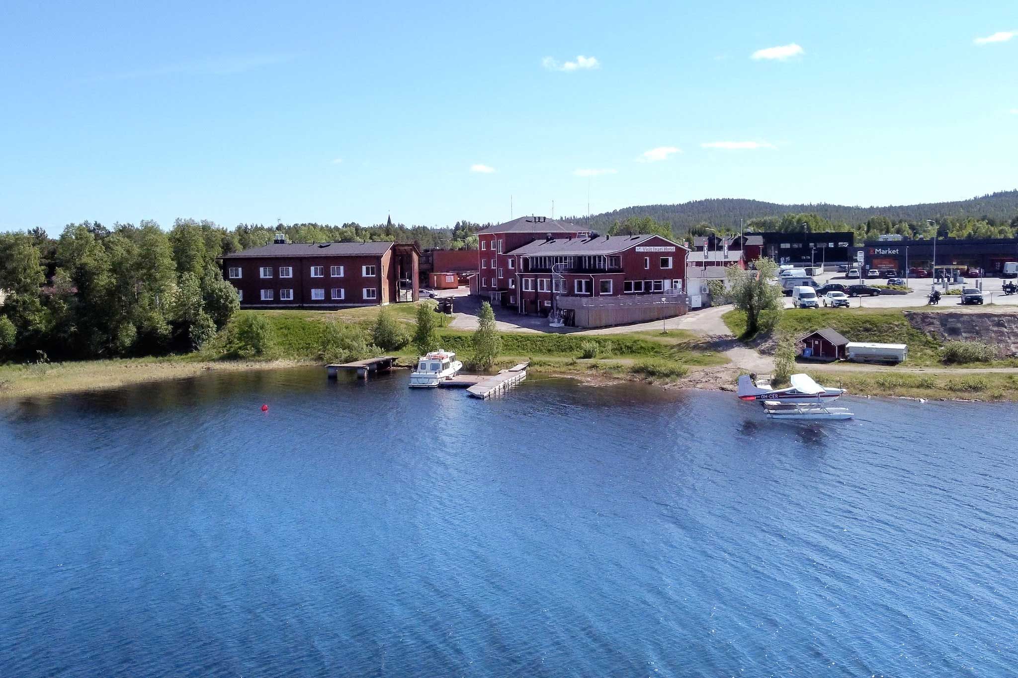 Hotel Inari Winter, Inari Lapland Finland. Two snowmobilers in the front. Pic by Miika Leivo.