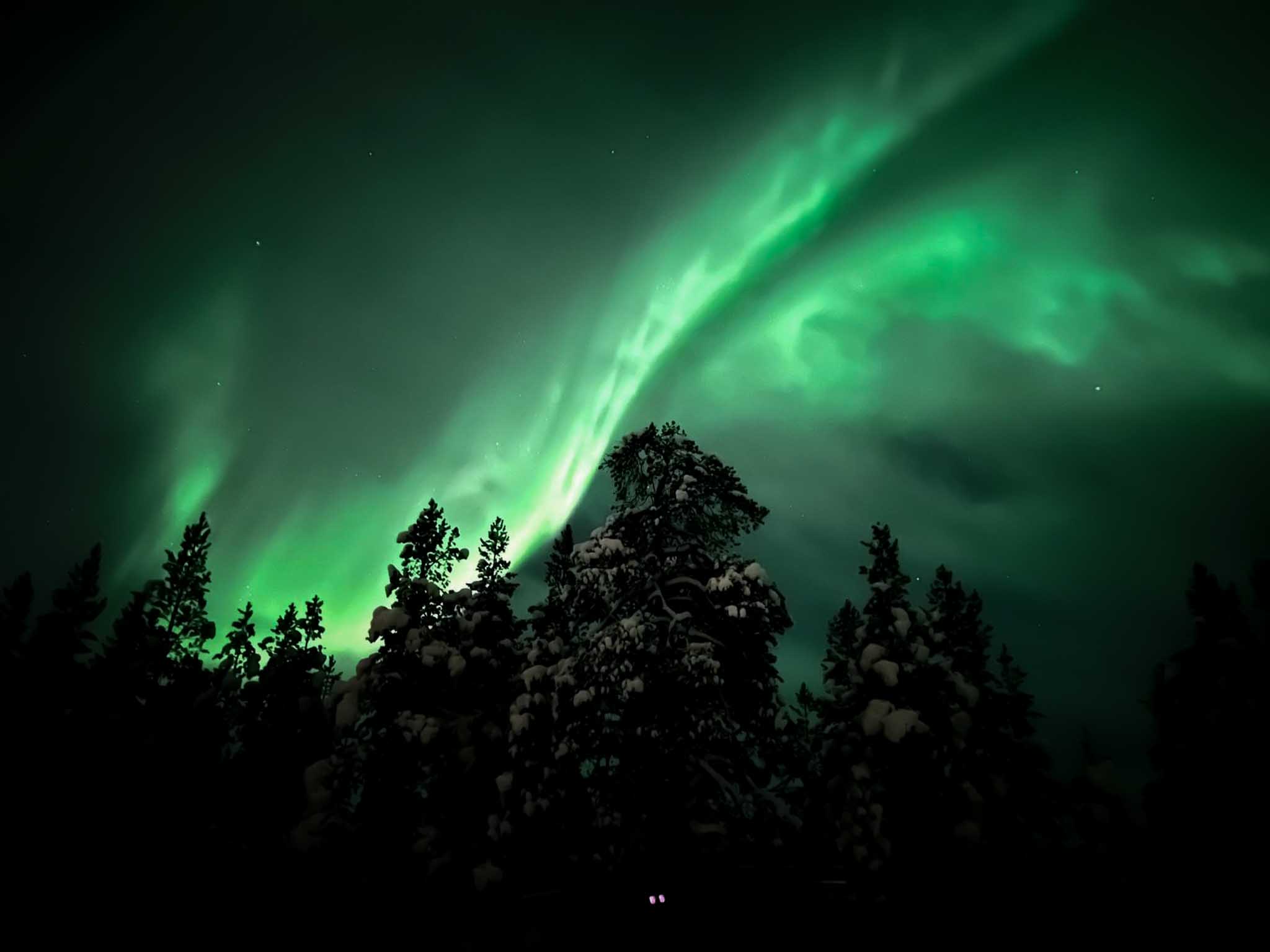 Dark sky with massive Northern Lights.