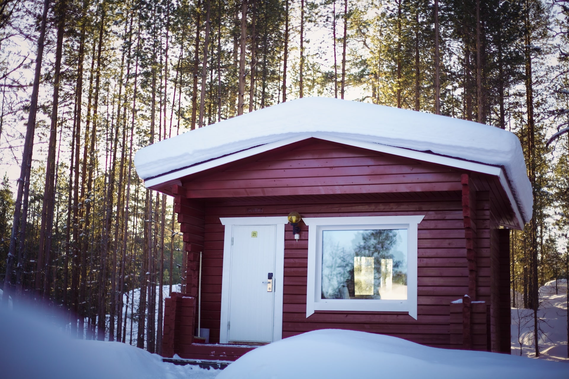 Crow Creek Cabin during Winter in Inari Lapland Finland. Sunny skies. Pic by Miika Leivo.