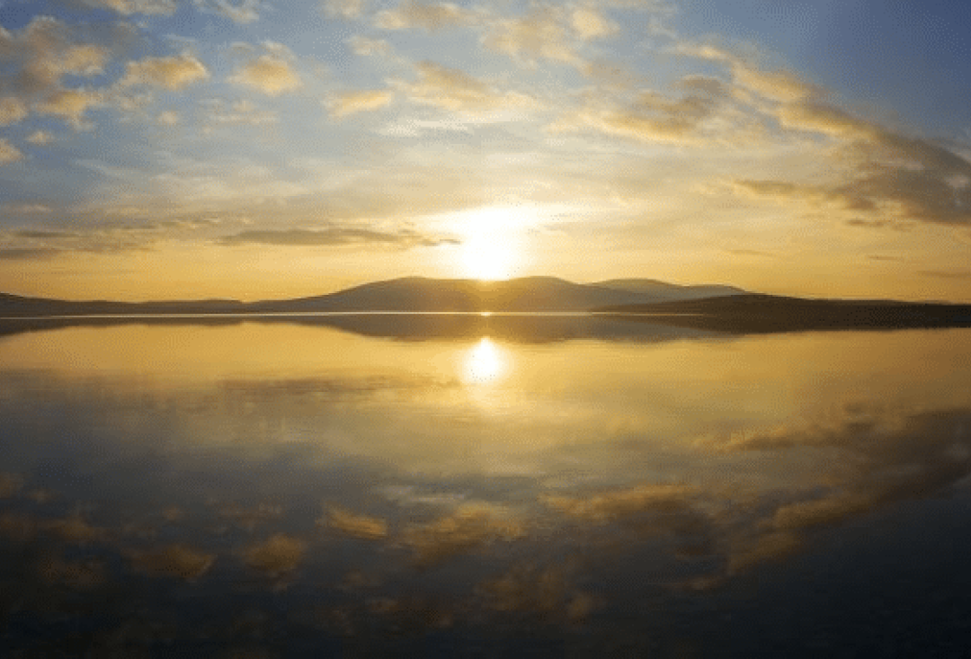 View of a big lake on sunset.